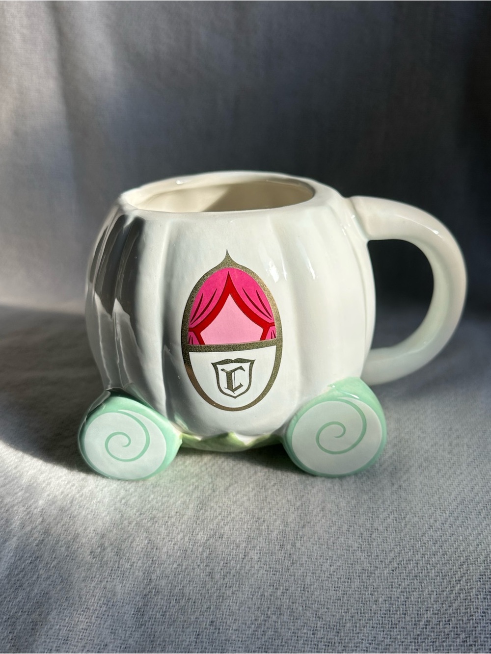 Disney White Carriage Mug with Pink Accent and Mint Wheels